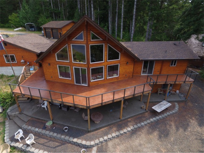 View more about Beachfront Home With Seamless Concrete Roof Deck